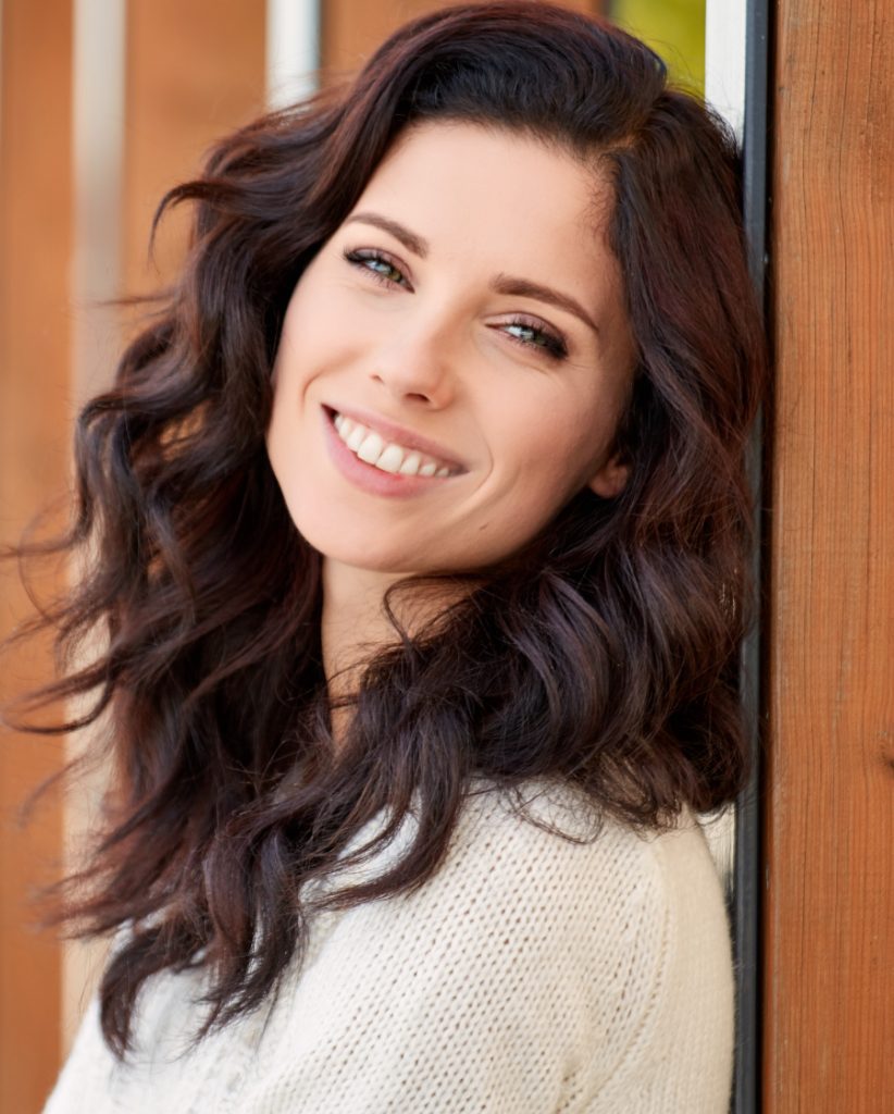 Smiling brunette woman with great skin