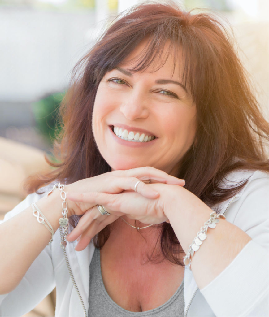 Happy woman after EMFEMME 360™ treatments